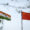 The national flags of India (L) and China are seen outside the Meijiang Meijiang Convention and Exhibition Center during the Shanghai Cooperation Organisation (SCO) Summit in Tianjin on August 31, 2025. (Photo by WANG Zhao / AFP)